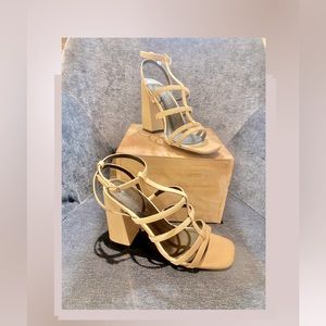 ASOS Strappy sandal with block heel in bone color.